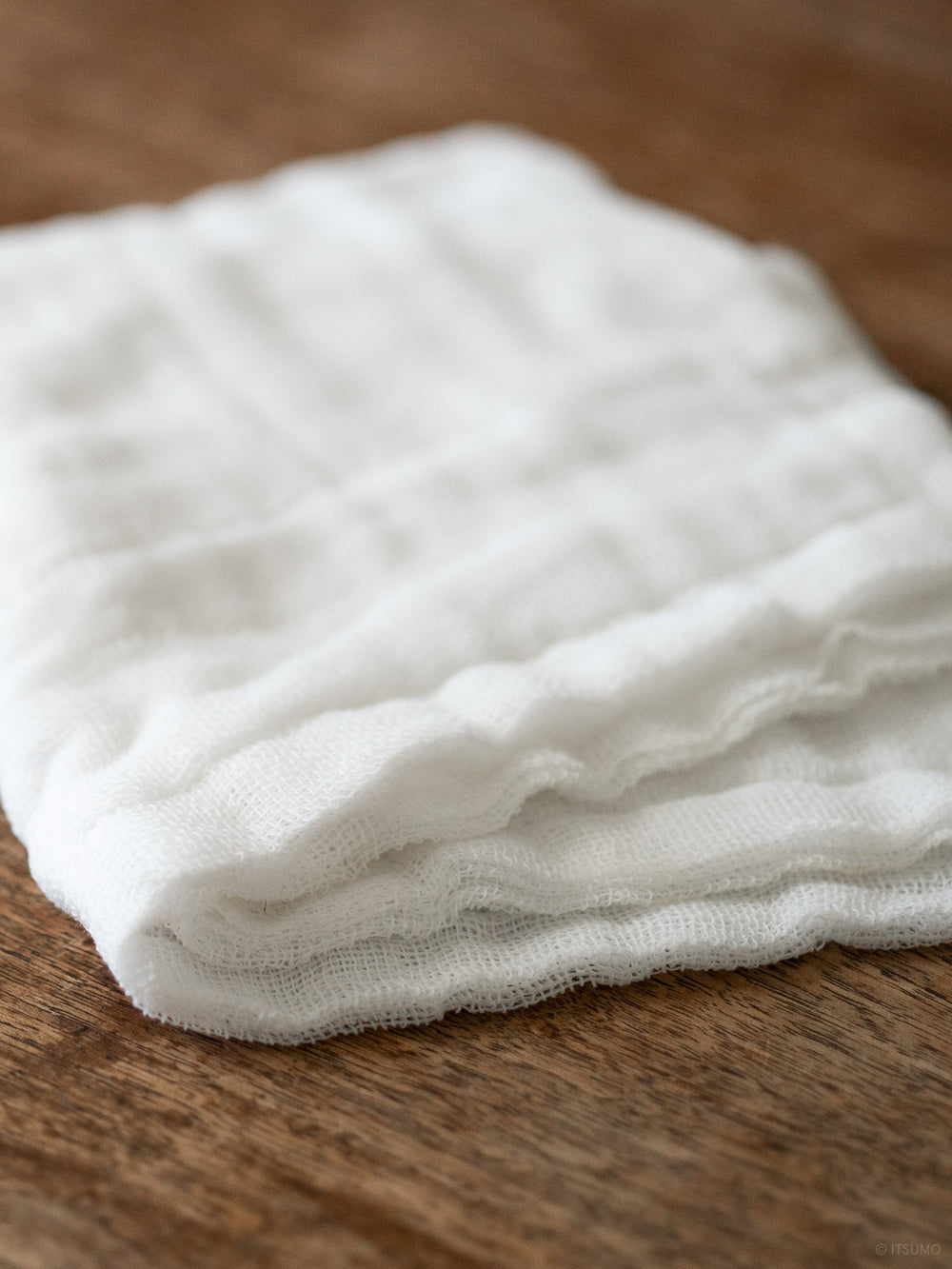 Close up texture of white Azmaya gentle face cloth made of japanese mosquito nets