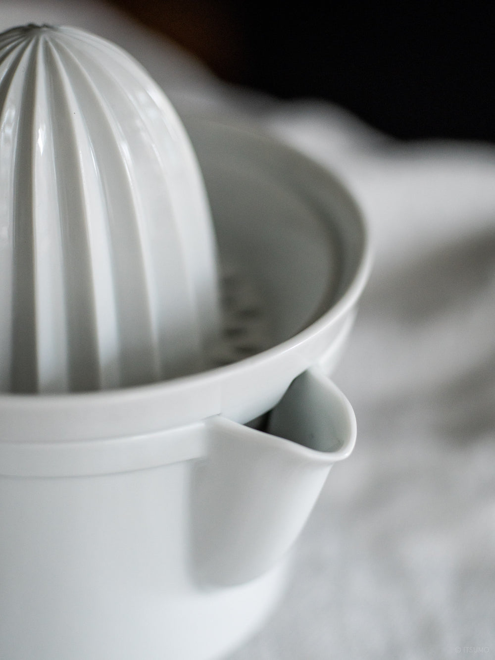 Azmaya large porcelain citrus juicer close up of the spout