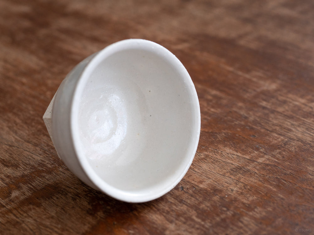 Small iga ware ceramic bowl with hexagon base in smooth white shino glaze