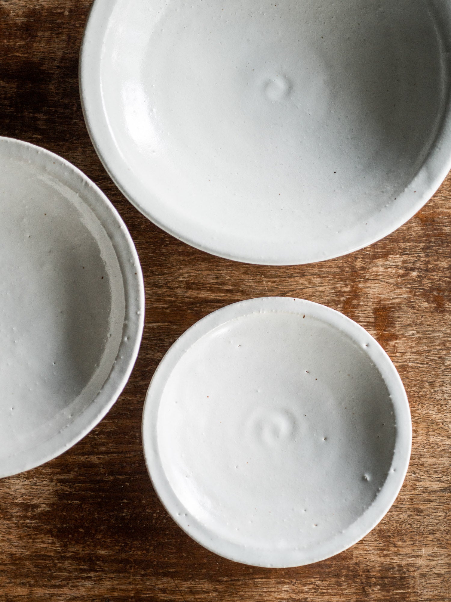 Azmaya iga ware plates in three sizes in a white shino glaze