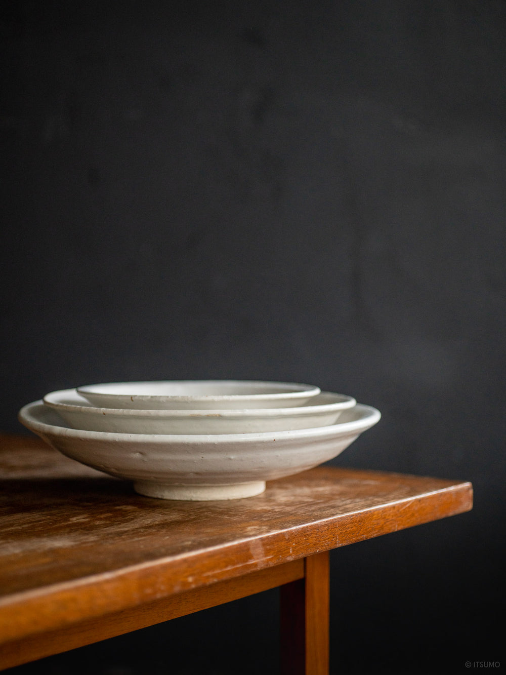 Azmaya iga ware pottery plates in three sizes: small, medium, and large