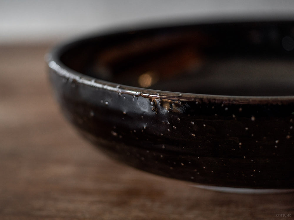 Close up detail of textured ceramic glaze on an iga ware large serving bowl