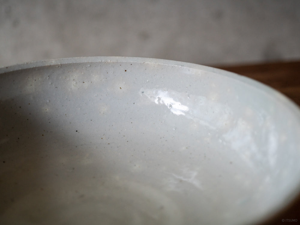 Close up detail of Azmaya's large serving bowl in a textured ceramic surface and white sekkai glaze