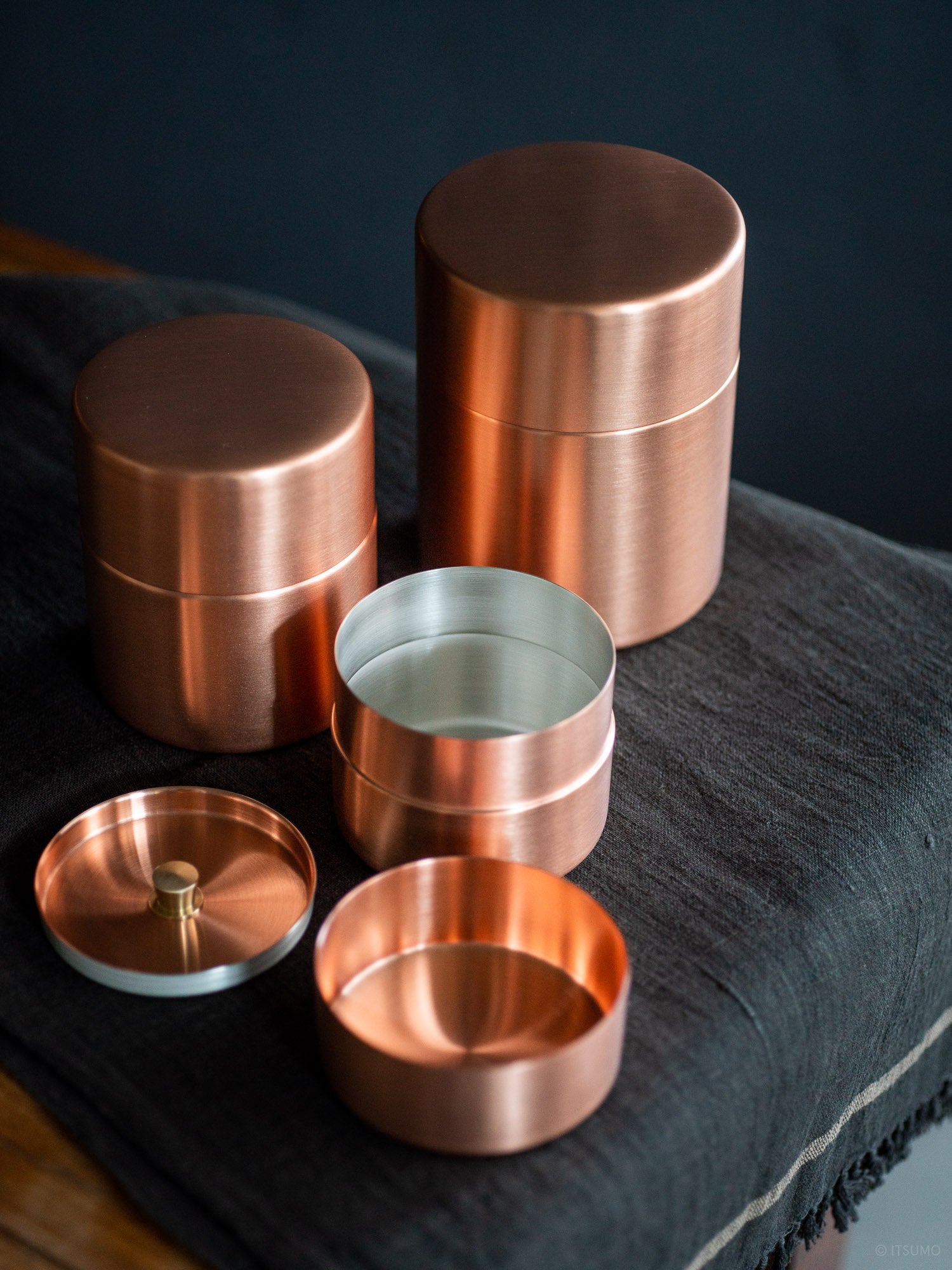 Open Azmaya copper tea canister showing the lid and second inner lid