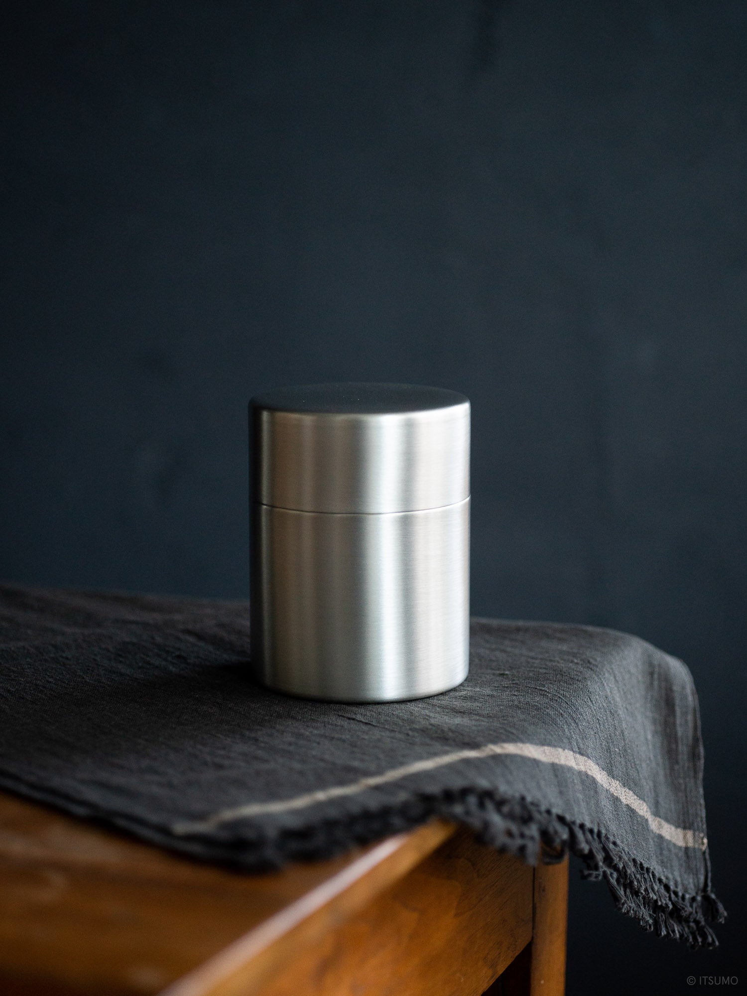 Tin plated Azmaya tea canister with a copper base, in silver color