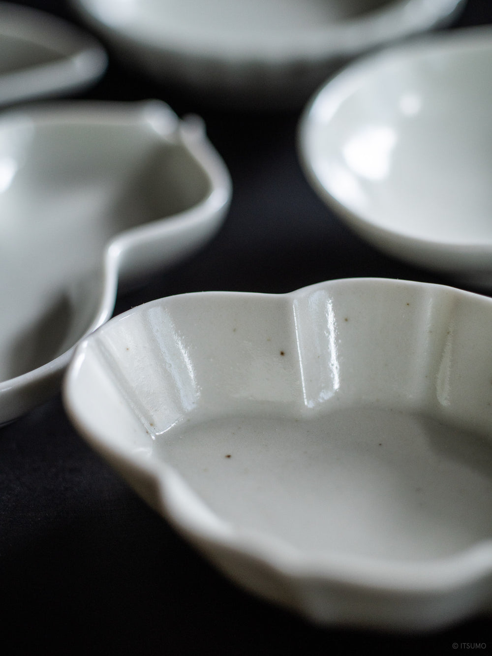 Close up of small Azmaya serving dish in Sekkai glaze made in Japan