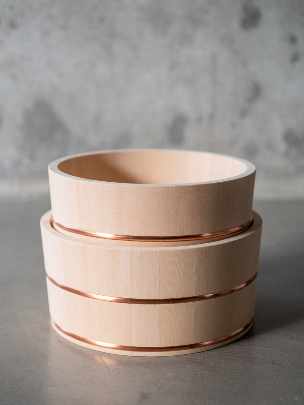 Two Azmaya hinoki wood bath bowls with copper trim