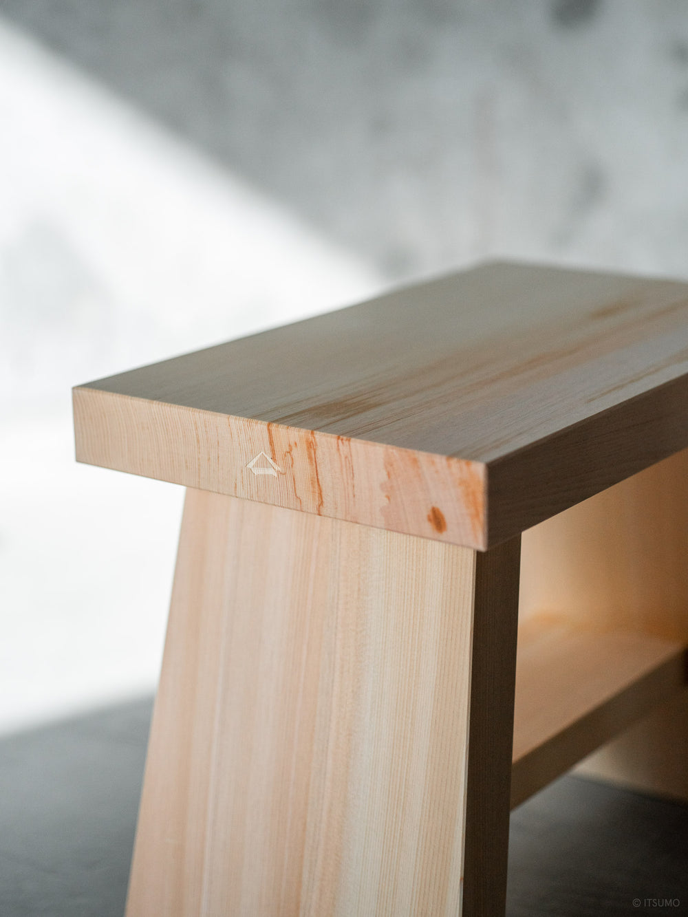 Close up detail of the wood grain on the Azmaya hinoki bath stool