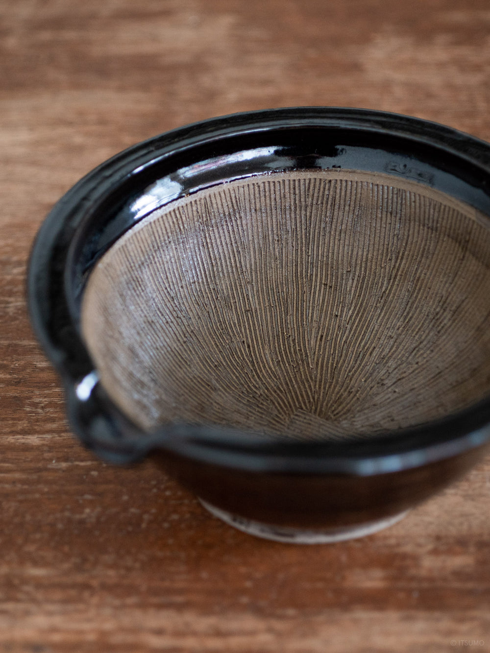 Inside of iga suribachi mortar showing textured lines, made using iga-ware pottery techniques in Japan