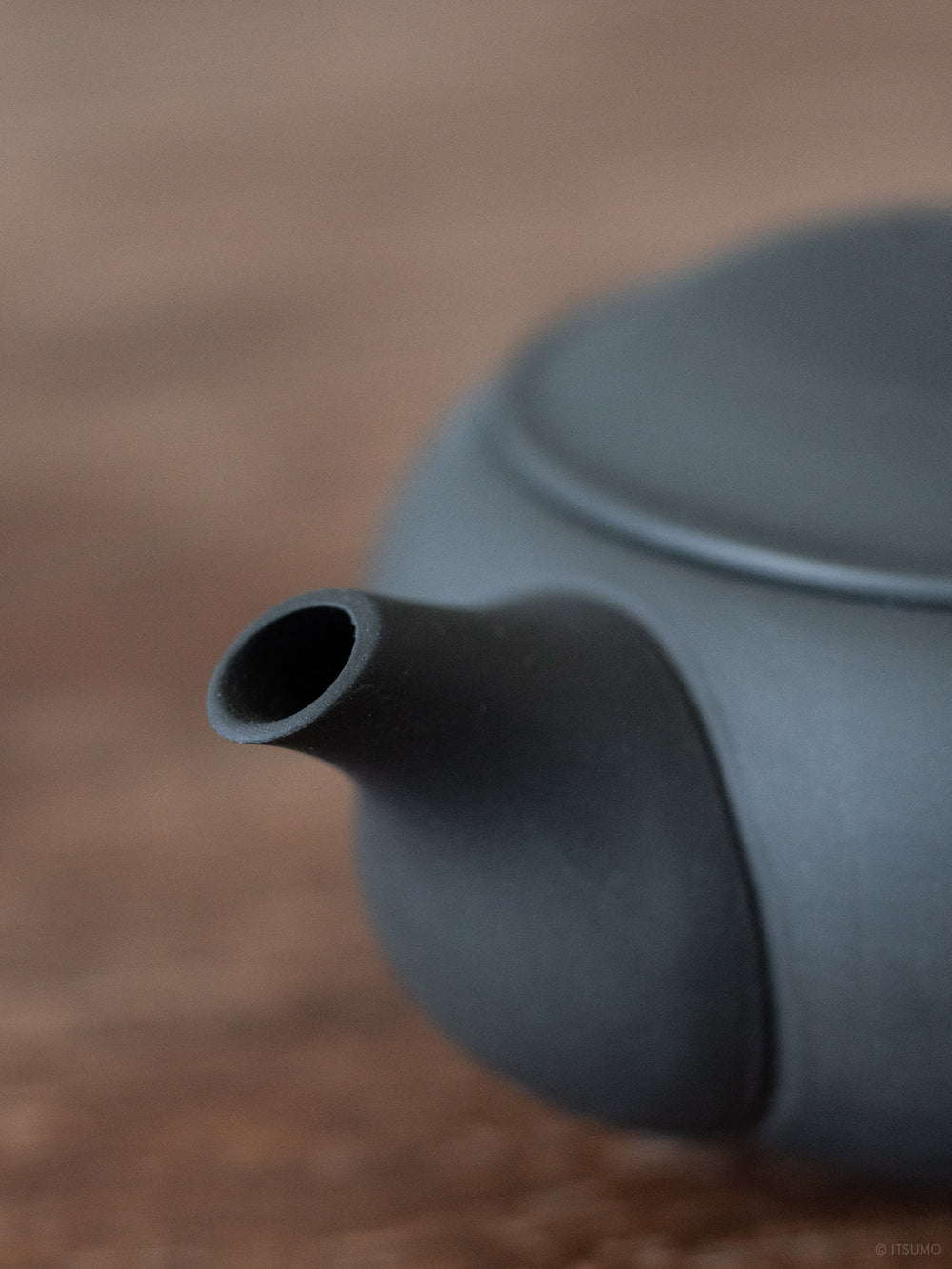 Azmaya’s oval teapot spout in unglazed in matte black ceramic