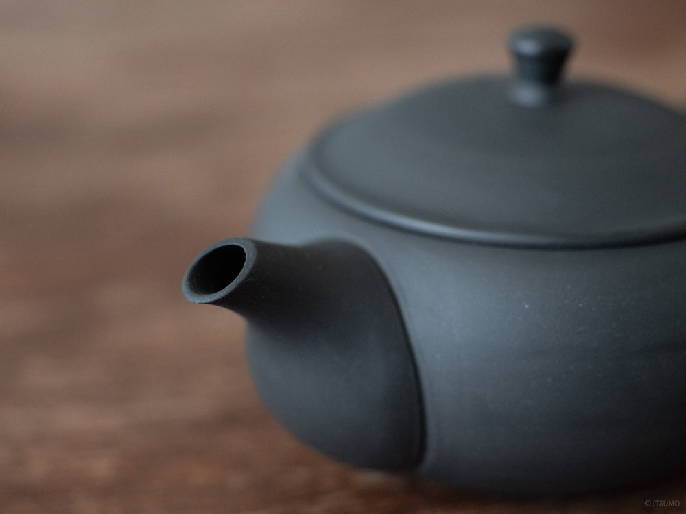 Azmaya ceramic oval teapot in unglazed matte black with spout
