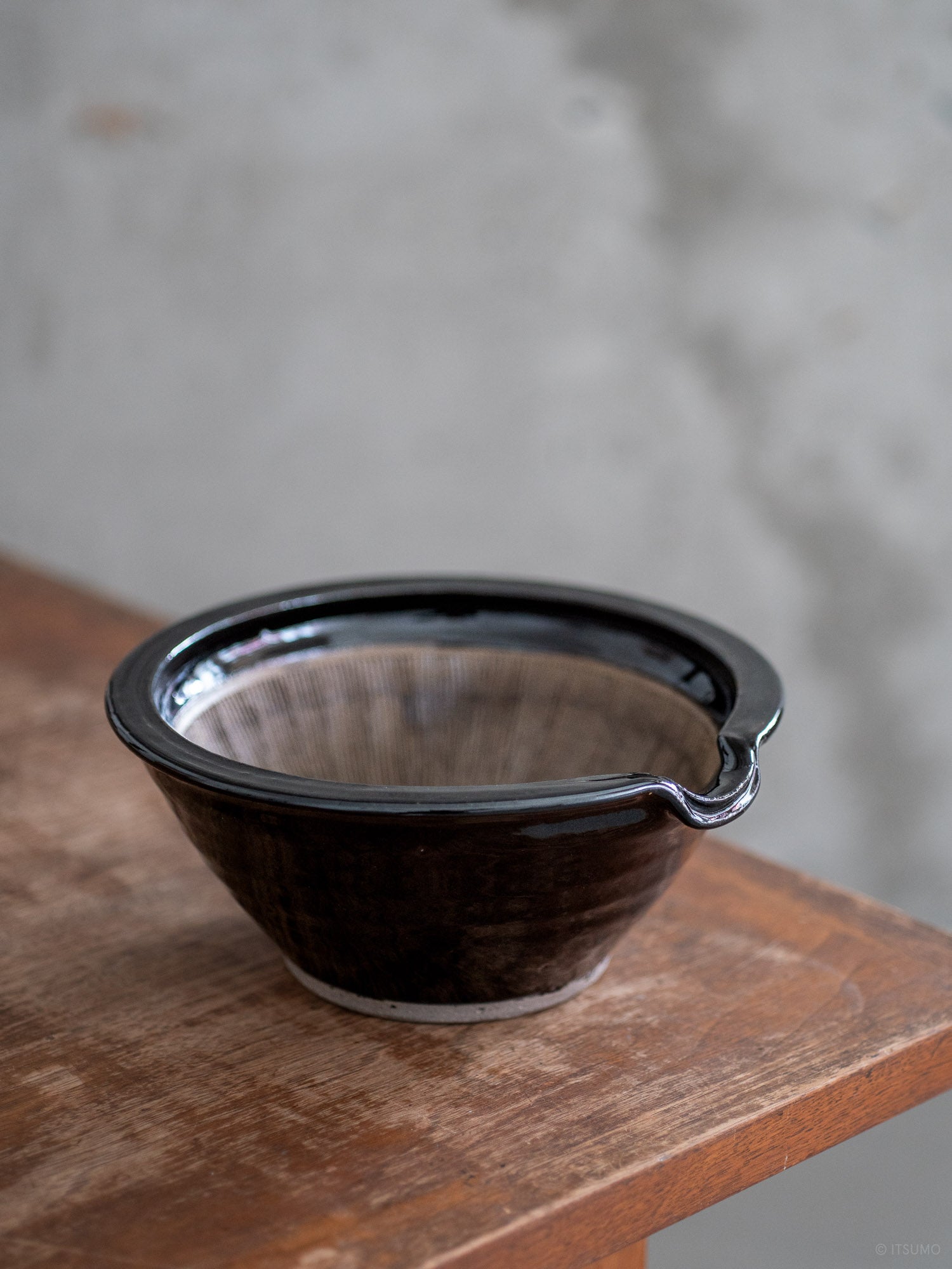 Iga suribachi mortar in black glaze, using iga-ware pottery techniques