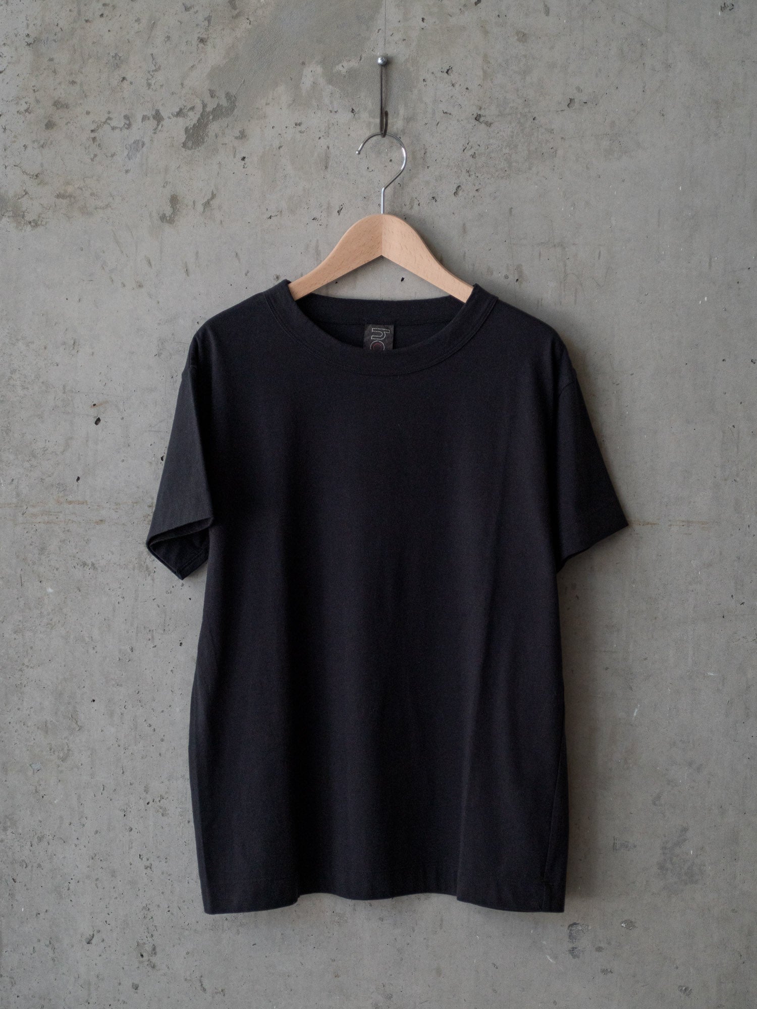 Black t clearance shirt in hanger